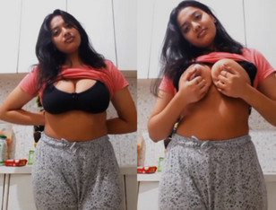 Cute chubby girl showing her big tankers