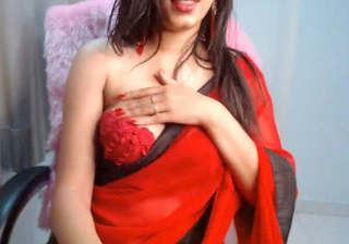 Beauty in Red Saree Pressing her boobs looking stunning