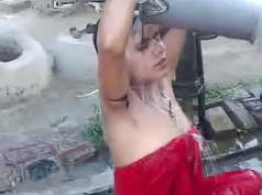 Young bhabhi having outdoor bath