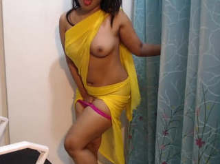 Horny girl in yellow saree seducing